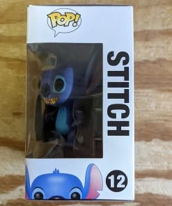 Spastic Pops Stitch Alternative Name: Stitch Blue Label (Not Disney Store) Type: Vinyl Art Toys Pre-Loved!